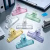Clipes de mola de gelatina coloridos semitransparentes Clips de armazenamento e organização para cadernos de escritório e estudo Clips portáteis de mesa
