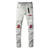 Marca europea y americana de moda de calle transfronteriza, jeans ajustados skinny casuales de color claro, elásticos, con parches rojos rasgados para hombre