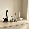 Una familia de cuatro ciervos adornos de decoración para el hogar luz de lujo sentido de alta gama recibidor sala de estar mueble de TV mueble de vino decoración