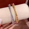 Pulseira de cruz de zircônia transfronteiriça europeia e americana, luxo leve, alta qualidade, elegante, versátil, moderna, joias femininas de nicho atacado