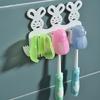 Estante de almacenamiento de pared para baño sin perforaciones, lindo soporte para cepillos de dientes de dibujos animados para niños, escurridor a prueba de polvo, suministro directo de fábrica