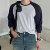 Camiseta de manga raglán con bloques de color para hombre, un atuendo sencillo, elegante y casual para el día a día, perfecta como camiseta de manga larga para otoño