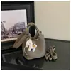 Bolso tote elegante y sofisticado para mujer, nueva colección 2026, bolso cruzado casual, bolso de mano de nicho para mujer, bolso tipo cubo