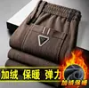Calças Casuais Masculinas 2026 Outono/Inverno Perna Reta Business High-End Veludo Cotelê Calças de Trabalho Elegantes Quentes Cintura Elástica