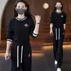 Conjunto de Ropa Deportiva para Mujer 2025 Primavera y Otoño Nuevo Estilo Sudadera Ajustada de Cuello Redondo Pantalones de Pierna Ancha Conjunto Casual de Dos Piezas para Reducir Edad