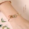 Agata Yanyuan pêssego jade Hetian cordão semi-feito à mão verde água transparente elegante pulseira Xiangyun feminino atacado
