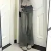 Jeans acampanados de cintura baja estilo chica picante americana para mujeres petite, diseñados para ser holgados y estilizar, con corte de campana y largo hasta el suelo, talla XS
