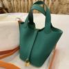 2024 Novo estilo de saco de cesta de legumes TOGO Bucket Bag Top Layer Cowhide Handbag New Style All-match bolsa de grande capacidade