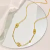 Cadena de suéter de acero inoxidable europea y americana de alta gama versátil cadena para la clavícula con letra CD collar de nariz de cerdo dorada vintage para mujer