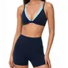 Nuevo traje deportivo bicolor para mujer, a prueba de impactos, de soporte, transpirable, sujetador deportivo y shorts de yoga de dos piezas falsos