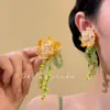 Aretes de Pétalos Morados Estilo Hada Errante de Flores, un Artículo Popular en Xiaohongshu, Dulces y Sorprendentemente Hermosos, Aretes Elegantes