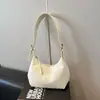 Bolso de axila de diseño nicho coreano para mujer, nuevo bolso versátil tipo dumpling de alta gama, bolso de mano y bolso de hombro