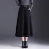 Saia de Lã Estampada Linha A Feminina 2026 Outono Inverno Nova Cintura Alta Moda Barra Larga Emagrecedora Casual Midi