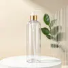 Yuzhuang Botella redonda de hombro de PET de 24 dientes para aceite esencial de 300 ml Botella de champú de acción de bomba Envase de botella de plástico vacío para el cuidado del cabello