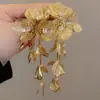 Hija de familia rica ~ aretes de trigo con borla larga dorada para mujer, aretes de lujo ligero de alta gama, aretes de atmósfera exagerada única