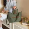 Comércio exterior por atacado moda europeia e americana letra 2026 nova bolsa de ombro retrô grande capacidade bolsa tote para trabalho e deslocamento