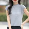 Suéter de Tricô com Gola Alta Meia-Boca em Lã Fina, Mangas Curtas com Pequenos Babados, Base em Tricô Jacquard Vazado para Mulheres - Coleção Primavera/Verão 2026
