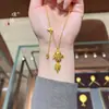 Tienda de oro Puzuo con el mismo estilo collar de borla de seda de oro arenoso de carpas para mujer nuevo retro chino cadena para la clavícula de pez dorado de la suerte