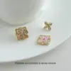 Pendientes de botón de trébol de cuatro hojas con diamantes completos de lujo ligero de moda francesa Versátiles de alta gama Exquisitos Personalidad Nicho Para ir al trabajo Pendiente de venta caliente