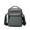 Bolsa de Ombro Única Masculina Cor Sólida Outono Urbana Simples Moderna Versátil Transversal Bolsa para Celular Masculina Material Oxford