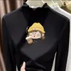 Camiseta de manga larga de terciopelo alemán con cuello alto y ribete de oreja de madera para niñas 2026 Otoño/Invierno prenda interior capa base top cálido cepillado