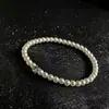 Pulsera de Zirconia y Perla de Lujo Ligero para Mujer Diseño de Nicho Pulsera Elástica de Perlas Elegante Versátil Regalo Fábrica de Anillos Venta al por Mayor
