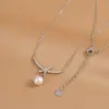 2023 Nueva Moda Elegante Cadena para Clavícula Diseño de Nicho para Mujer Collar de Lazo Exquisita Cadena de Collar de Perlas de Lujo Ligero