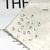 Rincones de alta calidad estilo Shijia para decoración de uñas, imitación de la famosa marca, mini strass biselados blancos súper brillantes de fondo plano, accesorios