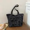 Bolso de tela tipo tote nuevo estilo coreano 2026 estampado, gran capacidad, moderno, adecuado para ir al trabajo y de moda para comercio electrónico transfronterizo