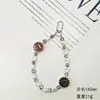 Moda de alta gama cuentas de perlas de cristal láser cordón para teléfono móvil corto portátil creativo cadena para teléfono móvil para mujer