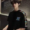 Camiseta de manga corta para hombre, marca de moda, corte holgado de verano, nuevo modelo 2026, tendencia de celebridad de internet, top estampado sencillo