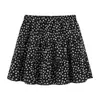 Falda con estampado floral negro para mujer, nuevo estilo de verano 2026, adelgazante, que cubre la cadera, versátil, falda de línea A de cintura alta, falda corta y larga