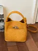 Bolsas pequeñas súper populares para primavera y verano para mujer 2026 nueva moda bolso cruzado versátil bolso de mano para el trabajo bolso tipo cubo bolso tote pequeño
