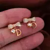 Moda Europea y Americana Creativos Pendientes de Cobre Chapado en Oro de Alto Gama con Forma de Lazo y Letra Nuevos Pendientes de Moda para Mujer