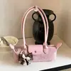 Bolso de hombro cruzado de moda de verano 2026 estilo coreano, nicho de moda versátil para mujer, bolso simple para el antebrazo para el día a día