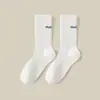 Calcetines de altura media Zhuzhi para hombre y mujer, estilo de pareja, versátiles, de moda, sin costuras, estilo japonés, calcetines largos deportivos de algodón puro, absorbentes de sudor