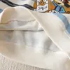 Sudadera de manga larga para niños, colección otoño 2026, para niños y niñas, diseño de dibujos animados estilo japonés, cuello de mezclilla, estilo casual a rayas, y un aspecto de dos piezas falso