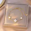 Collar Popular Transfronterizo de Trébol de Cuatro Hojas de Acero de Titanio para Niñas, Lujo Ligero y Versátil Nuevo Conjunto de Cadena Clavicular de Cinco Flores de Doble Cara