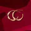 Pendientes Torcidos en Forma de C con Zirconita Brillante y Guadaña de Luna Llena Chapados en Oro Real de 18 Quilates Pendientes de Lujo Ligero de Alta Gama para Mujer