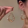 Pendientes de Borla Flor Geométrica Dulces y Exquisitos Estilo Coreano con Diamantes, Sensación de Lujo Ligero y Gama Alta, Pendientes de Nicho de Moda para Mujeres
