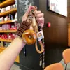 Miu Wind Agua Alcalina Pan Llavero Otoño e Invierno Maillard Lindo Colgante de Pan Pareja Estudiante Decoración de Mochila Escolar