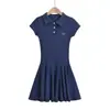 Vestido estilo college com gola polo de temperamento feminino 2024 verão novo com botões e design de strass cintura alta saia curta