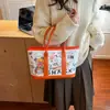 Bolsa Tote de Ombro Moda Versátil Estampada Graffiti Desenho Animado Nova Outono 2026 Fofa e Estilosa de Grande Capacidade para Sair