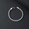 Venta al por mayor de pulseras de acero inoxidable con cadenas inversas y hacia adelante, accesorios de pulsera simples y de moda de acero de titanio para hombres y mujeres en Europa y América