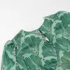 Moda Femenina Europea y Americana Vestido Verde con Estampado en Forma de Abanico, Venta Caliente en Aliexpress, Estampado Hueco, Espalda con Lazo, Corte Entallado, Vestido Largo