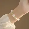 Pulsera de Camelia para Mujer Diseño de Nicho Ins Nuevo Verano Todo-partido Flor Perla de Imitación Pulsera Regalo para Estudiante