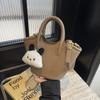 Bolsa de Mão Transfronteiriça Casual com Textura Simples Feminina 2024 Novo Design de Nicho Estilo Coreano Bolsa Saco de Balde Bolsa de Ombro Transversal