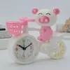Reloj despertador de alta gama con oso de dibujos animados en bicicleta, reloj de mesita de noche, regalo de empresa, suministro para papelería, exportación de AliExpress