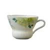 Taza de té de cerámica pintada a mano bajo vidriado de peonía y mariposa con asa, taza de maestro, juego de té kung fu para uso doméstico