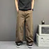 Pantalones casuales vintage marrones de dobladillo curvo para hombres y mujeres, otoño e invierno, diseño holgado y simple, pantalones de pierna ancha
